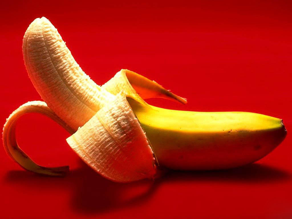 hulled Banana on red background, download photo, desktop wallpapers